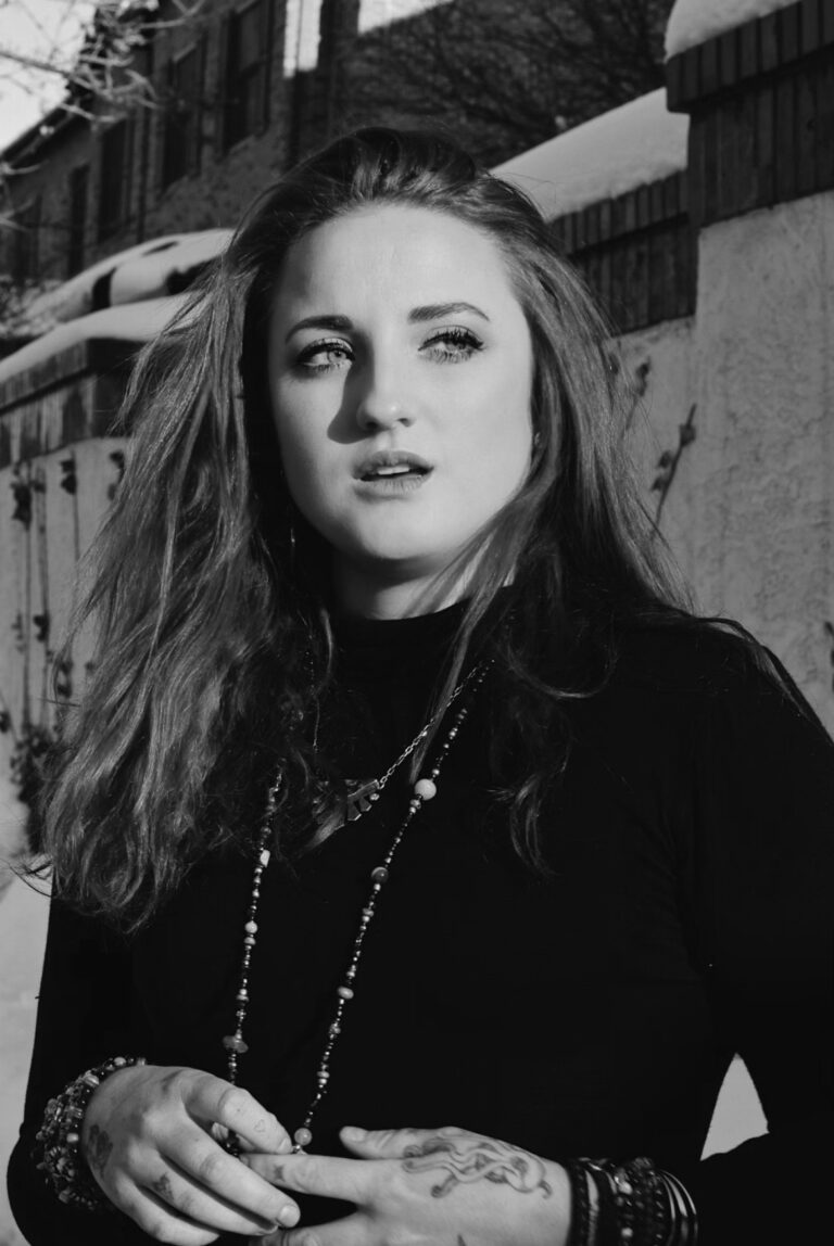 Belle — fine line tattoo artist at MT Tattoo Collective Denver