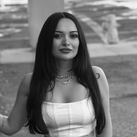 Aytach, tattoo artist at MT Tattoo Collective Denver, black and white outdoor portrait