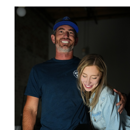 Happy client showing a detailed realism tattoo at MT Tattoo Collective