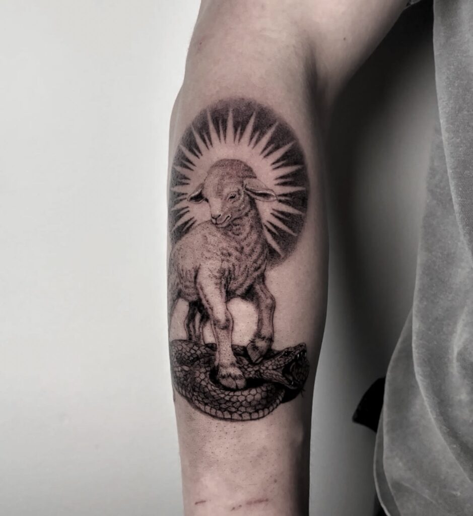 Fine line lamb with halo and serpent tattoo