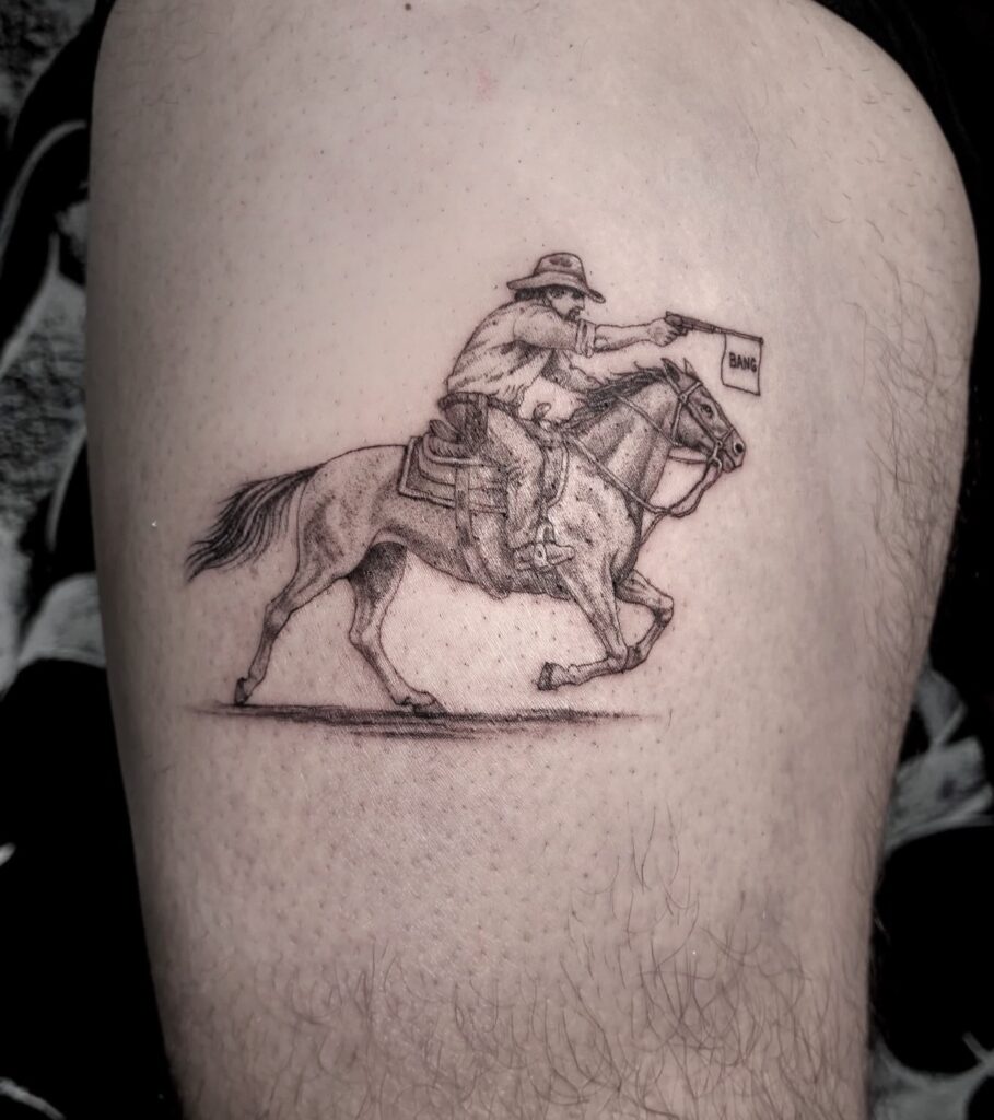 Fine line cowboy with hat on horseback tattoo