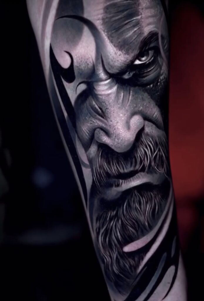 Black and grey Kratos God of War realism tattoo